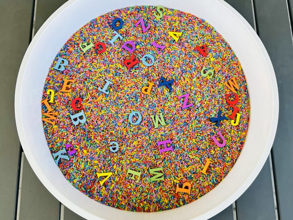 How To Make A Rainbow Rice Alphabet Hunt Sensory Bin