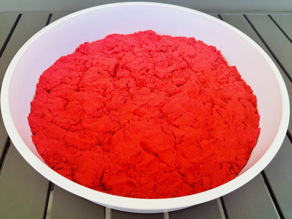 Kinetic Sand Filler Base Added to the Space Themed Sensory Bin