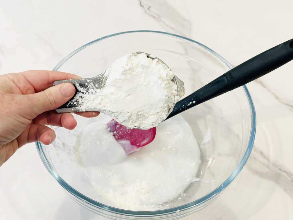 Adding Corn starch to the bowl with conditioner