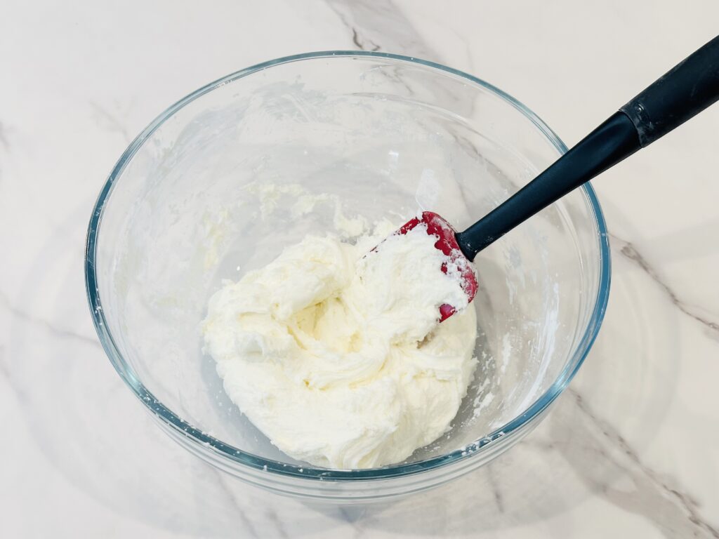 Mixing the corn starch and conditioner together.