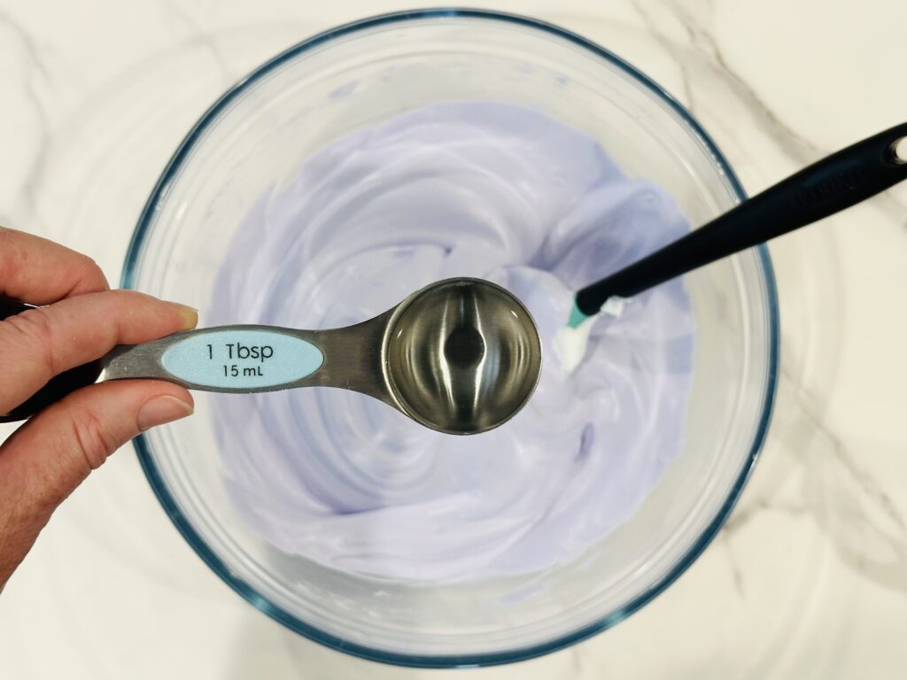 Contact solution added to the shaving cream, glue, and baking soda mixture.