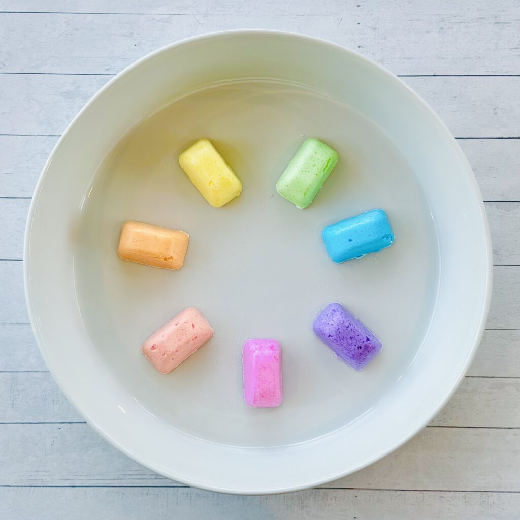 Frozen fizzy cubes on a baking dish