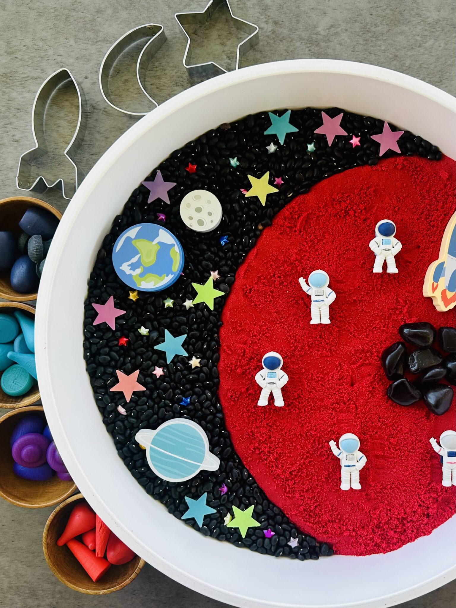 Space Sensory Bin Using DIY Kinetic Sand - Raising Wild Things Sensory