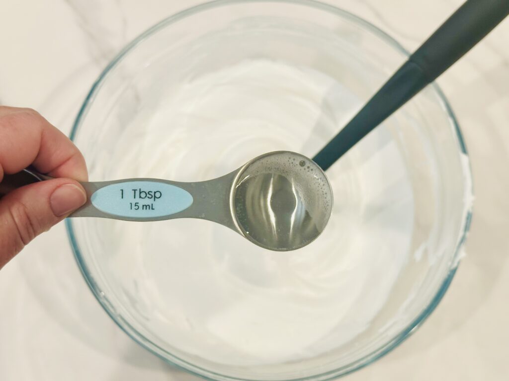 Adding contact solution to the slime mixture