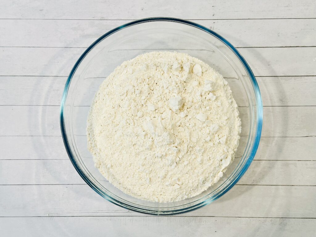 Heat treated flour added to mixing bowl