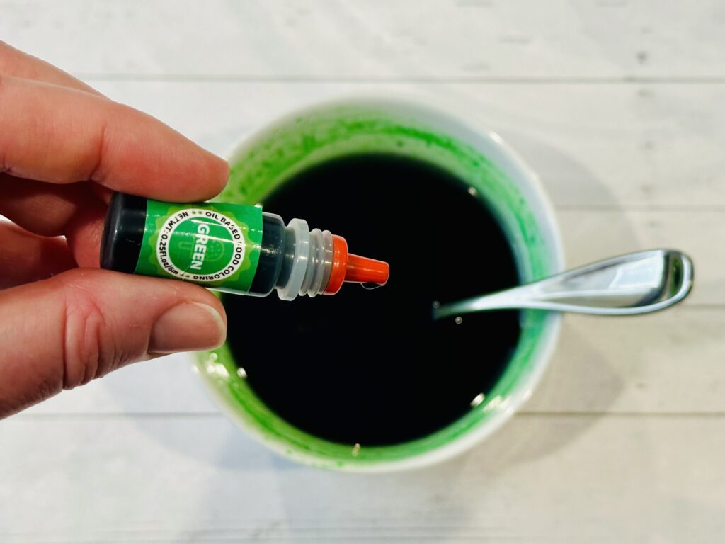 Oil based food coloring added to oil