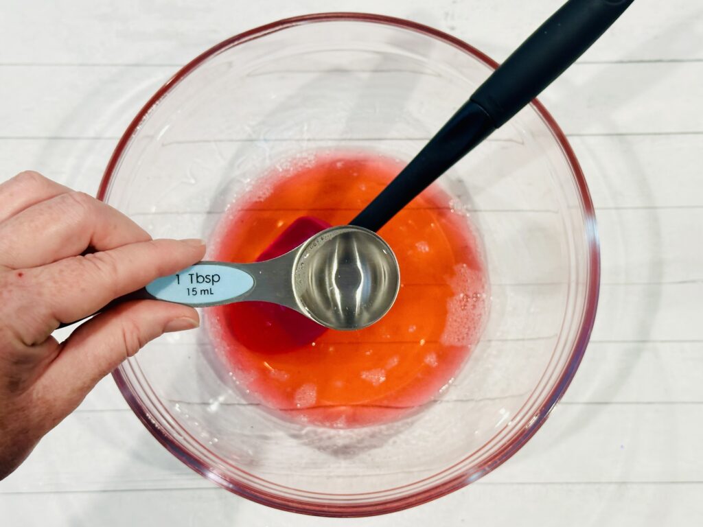 Adding in contact lens solution to the glue mixture.