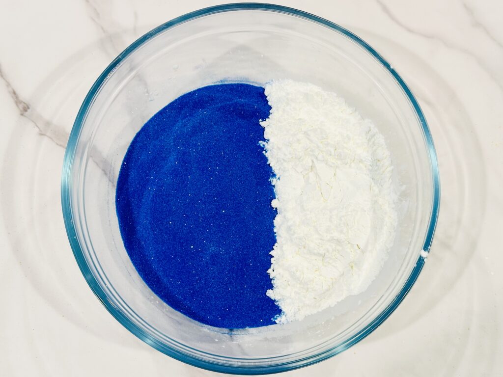 Fine play sand and cornstarch in a mixing bowl