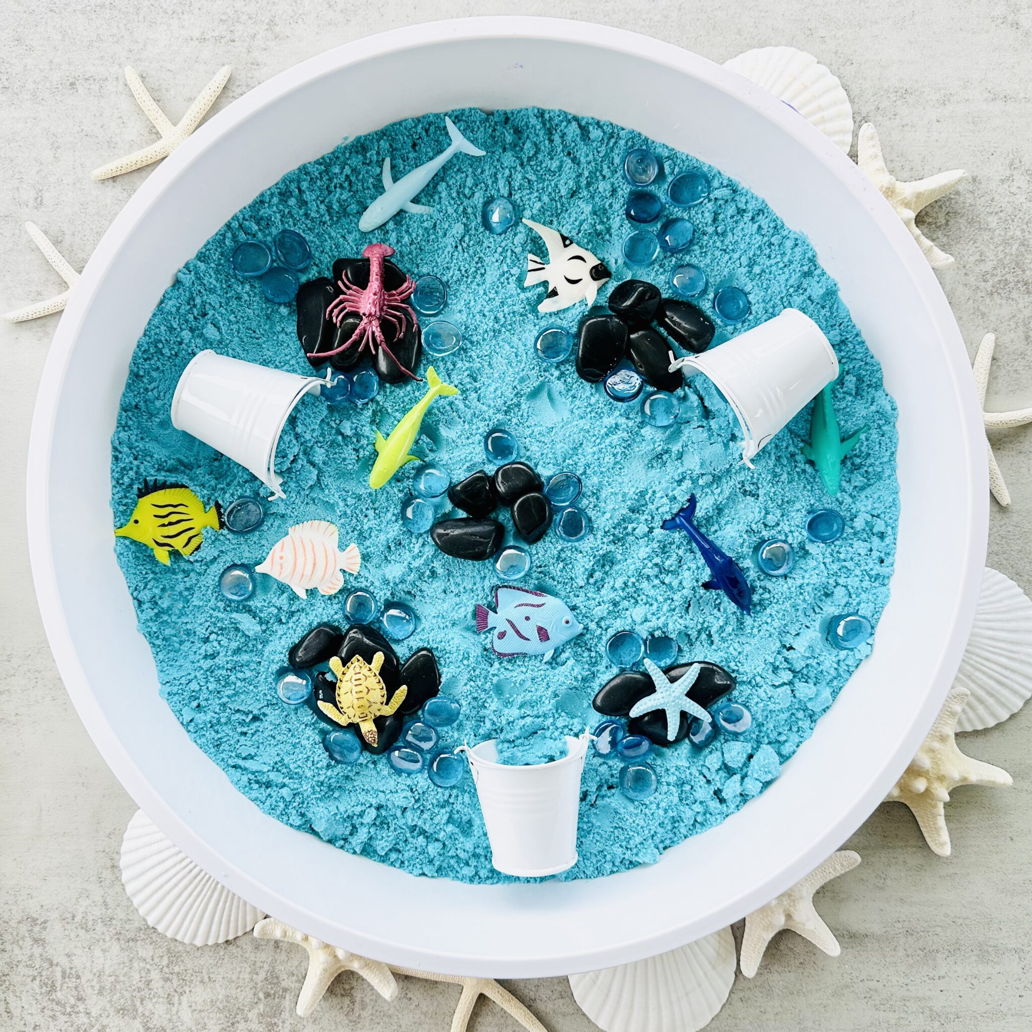 How To Make A DIY Kinetic Sand Ocean Sensory Bin - Raising Wild Things ...
