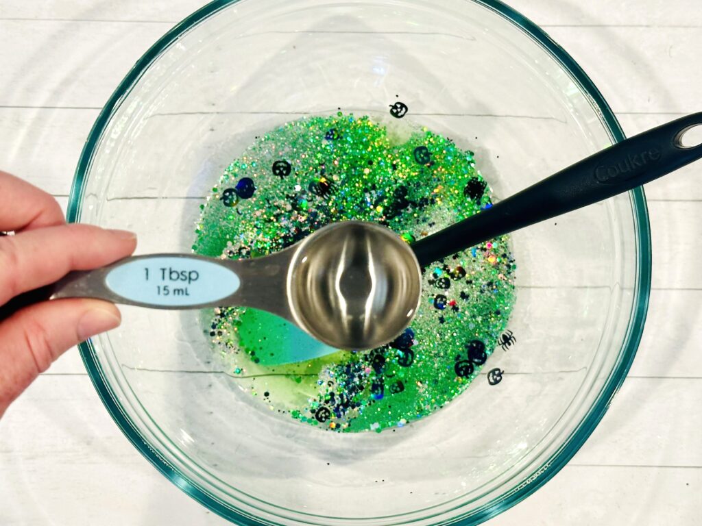 Adding contact solution to the slime mixture