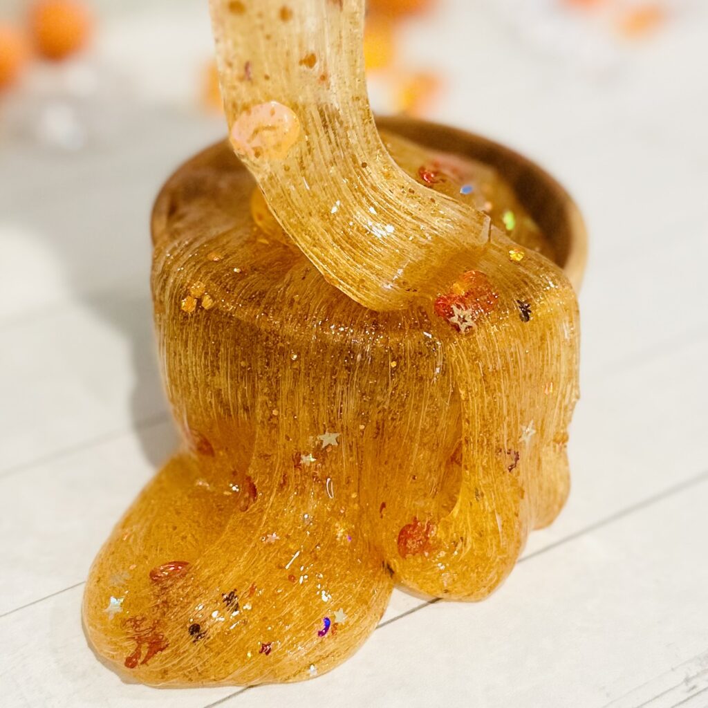 Glittery Pumpkin Slime - The Best Fall Sensory Activities For Kids