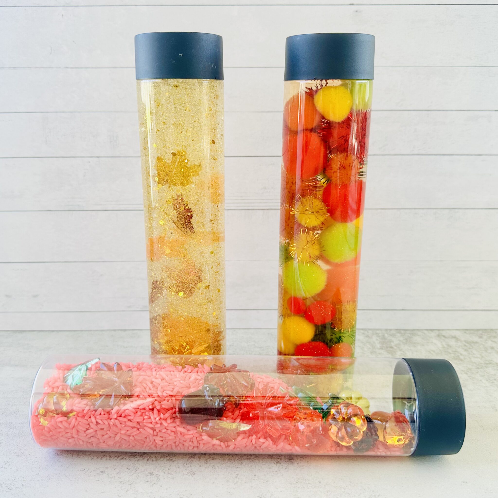 How To Make DIY Fall Sensory Bottles - Raising Wild Things Sensory