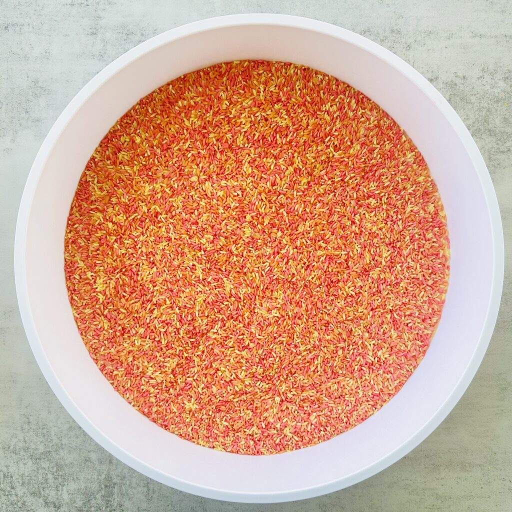 Fall-Themed Sensory Bin using DIY Colored Rice