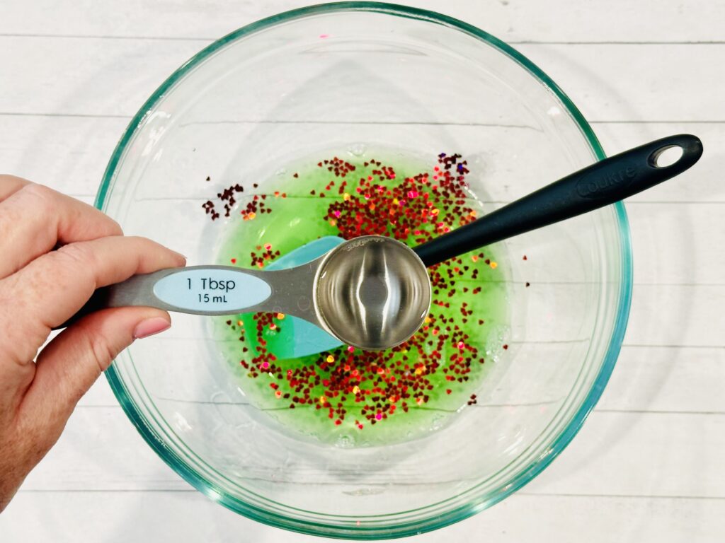 Adding contact solution to slime mixture