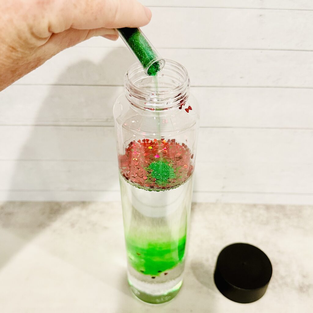 How To Make a DIY Grinch Sensory Bottle